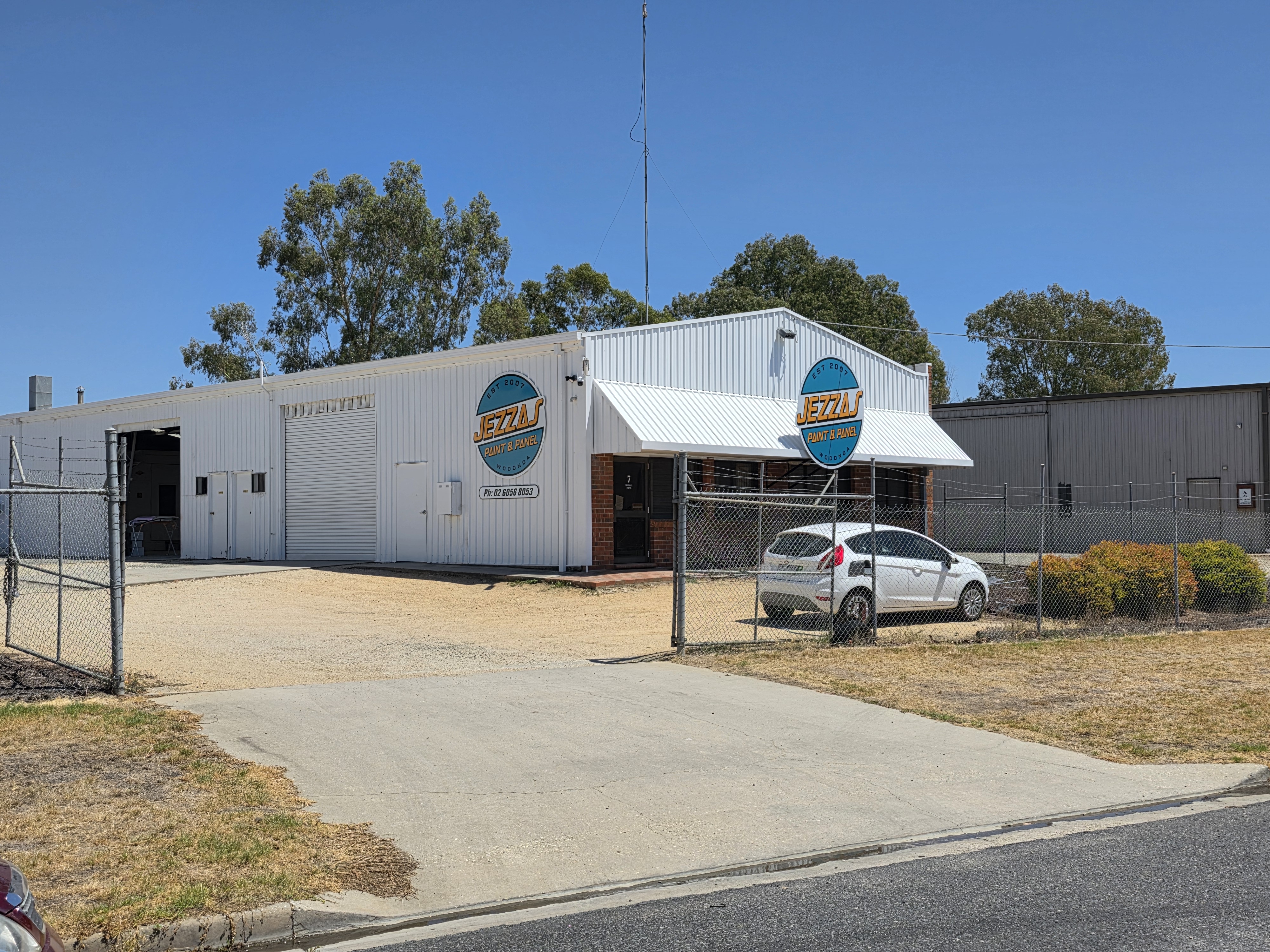 Jezza's Paint & Panel workshop building and driveway on Michael Drive, Wodonga
